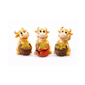 Sparebøsse figurer – søt ku med gullmynter