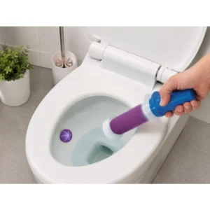 Toalettgelé-dispenser som påfører et rengjørende geléstempel på innsiden av toalettskålen.