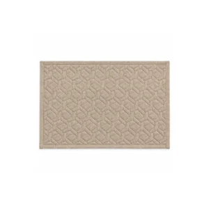 Rektangulær champagnebeige spisematte med glitter, geometrisk mønster og markert kant.
